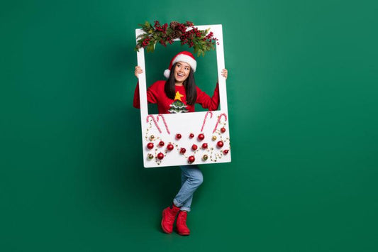 Woman posing in a holiday photo booth