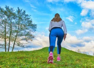 Uphill Walking & Other Low-Impact Workouts That Make Women Over 30 Look (and Feel) Amazing